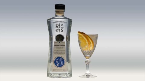 sir john conyers gin and glass with orange slices